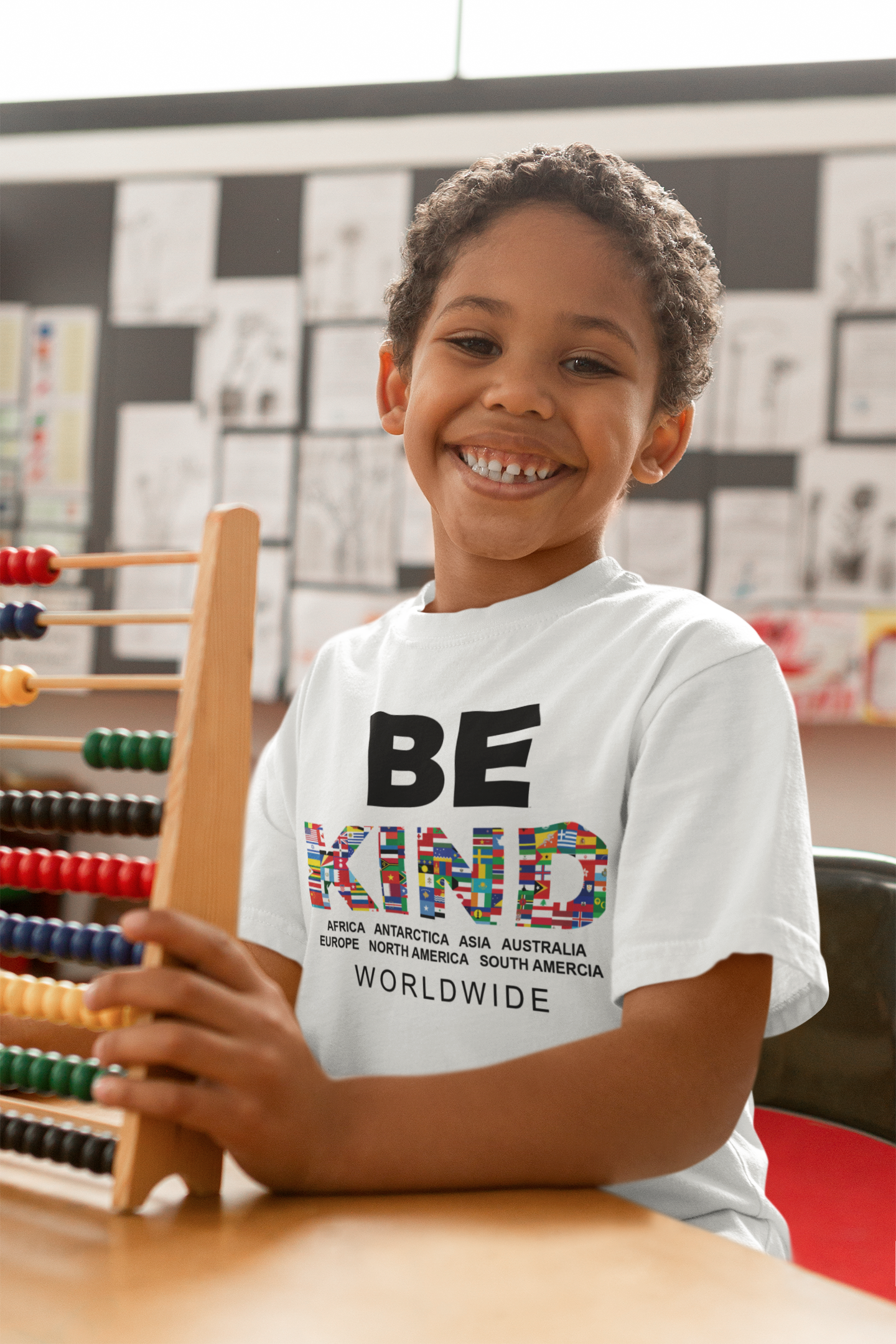 BE KIND WORLDWIDE KIDS TEE